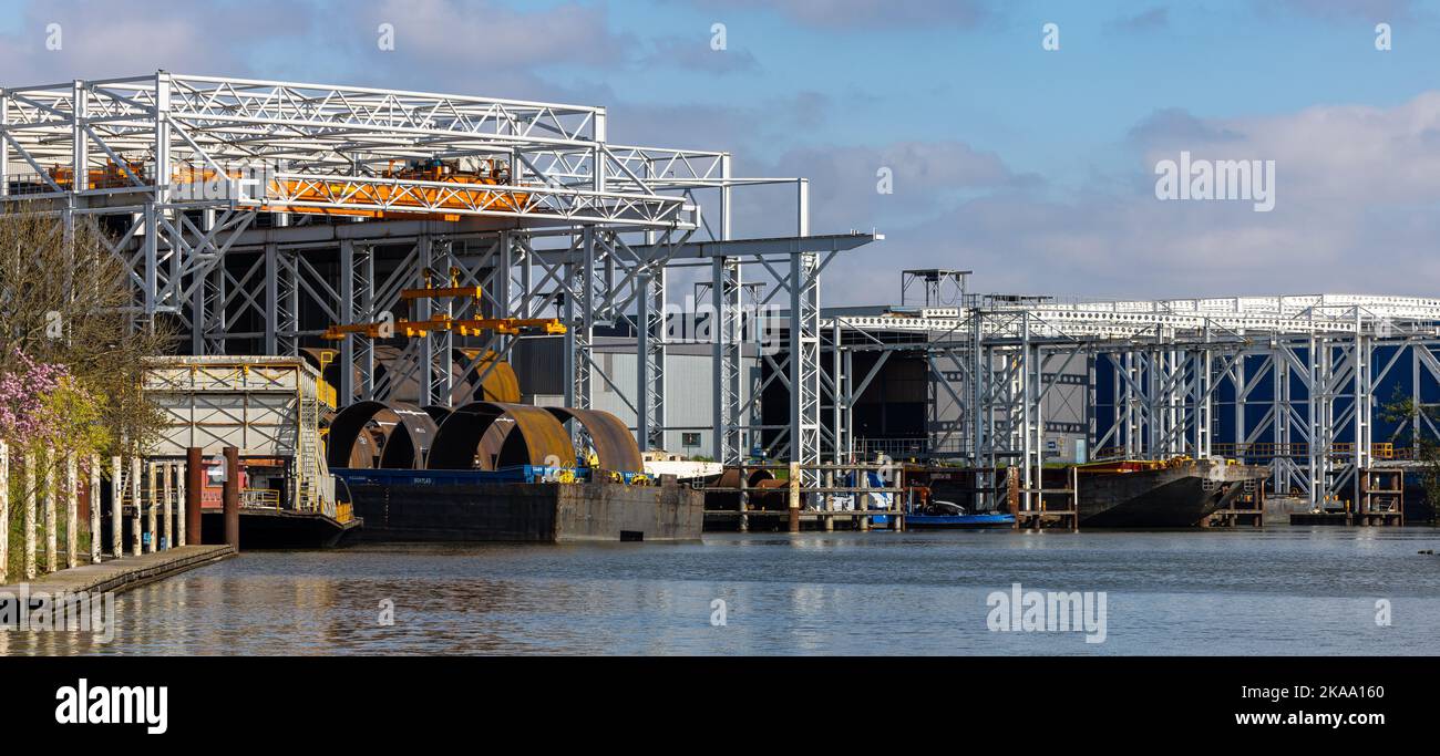 A closeup of a steel factory in an industrial harbor in Roermond Stock Photo