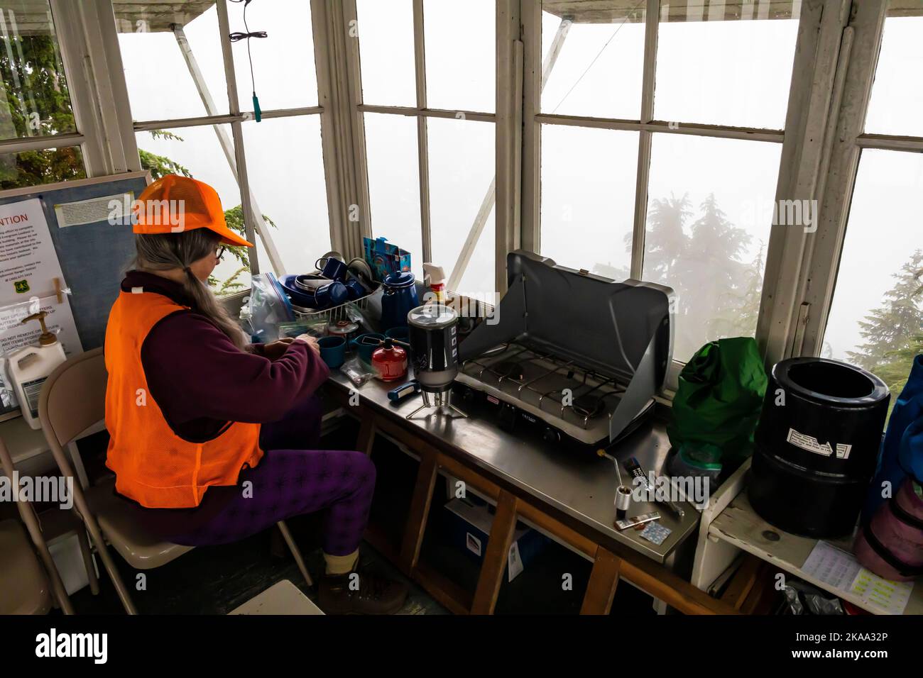 Karen Rentz wearing orange during hunting season, in Interior of