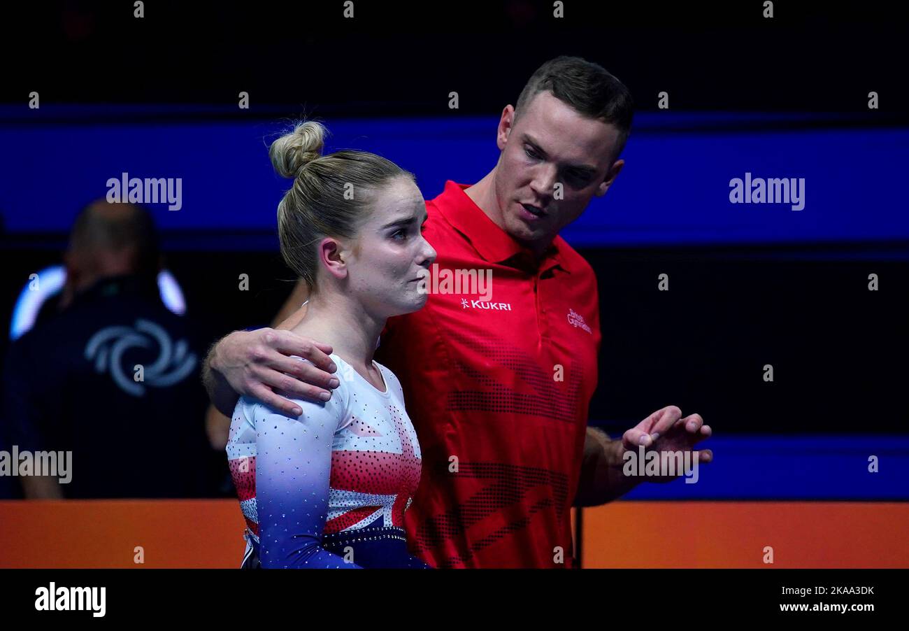 Great Britain's Alice Kinsella is consoled after falling from the