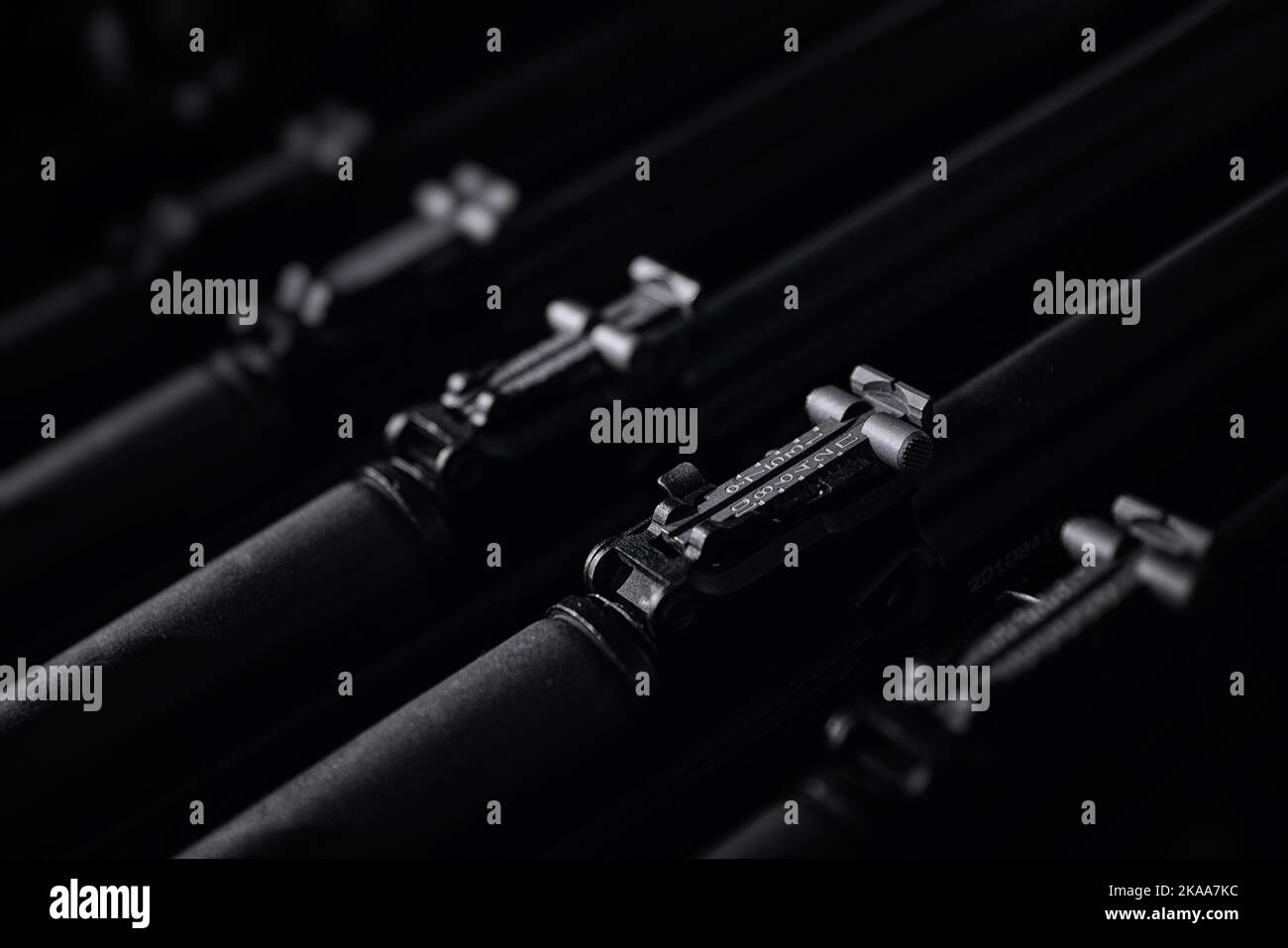 Stocks of weapons. New automatic rifles in a box. The sighting bar of