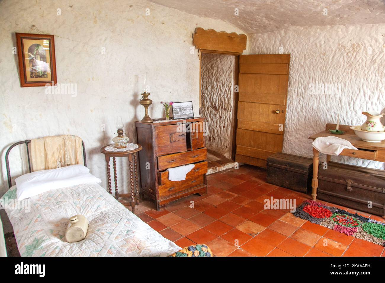 Inside view of Bedroom in one of the National trusts rock cottages on Kinver Edge Staffordshire England Stock Photo
