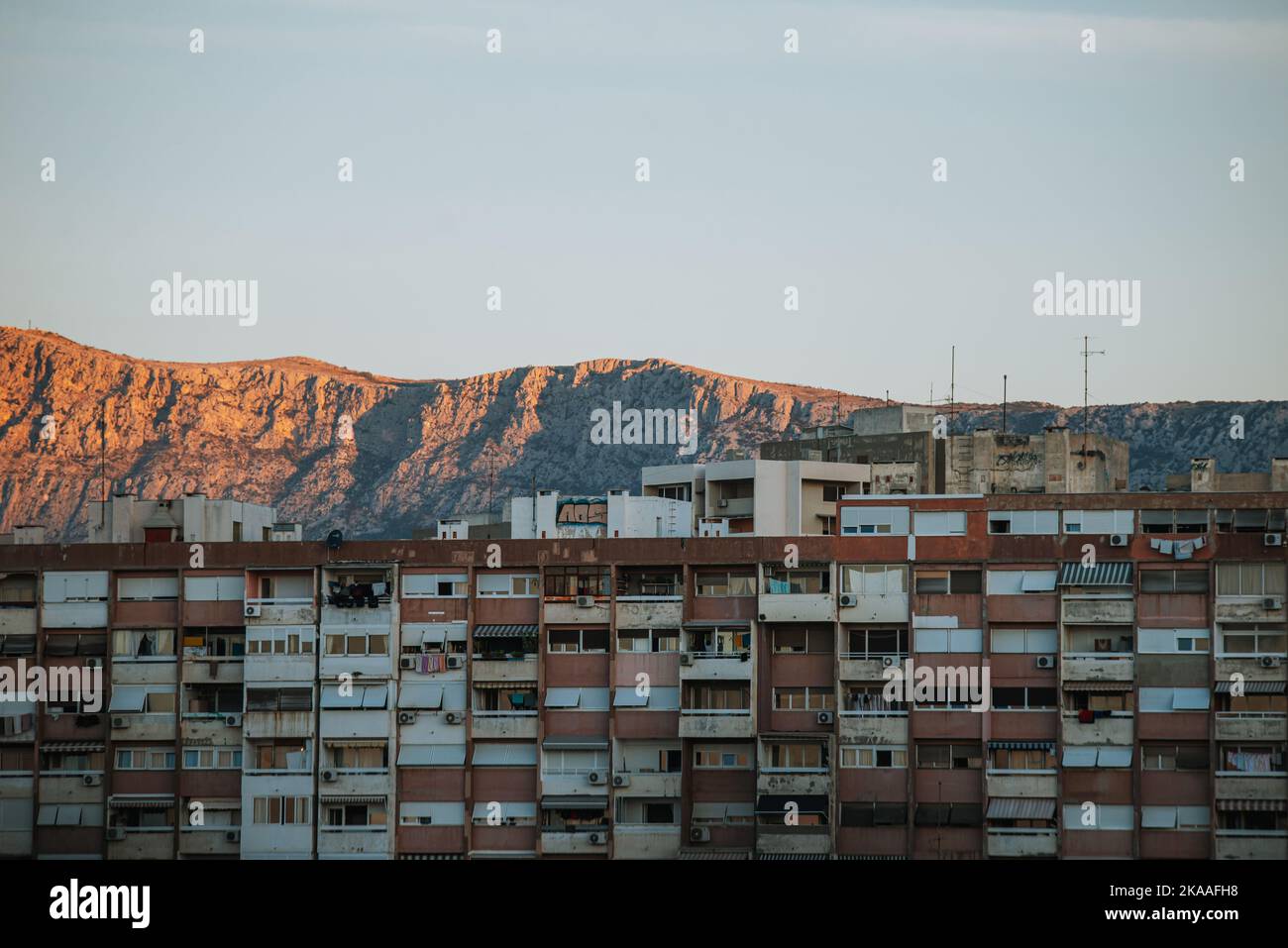 Split, Croatia - October 29, 2022: beautiful sunset over the hills in  Split with city buildings Stock Photo