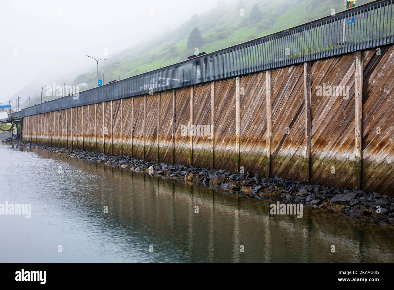 High and low water tide lines mark harbor pier; Kodiak; Kodiak Island