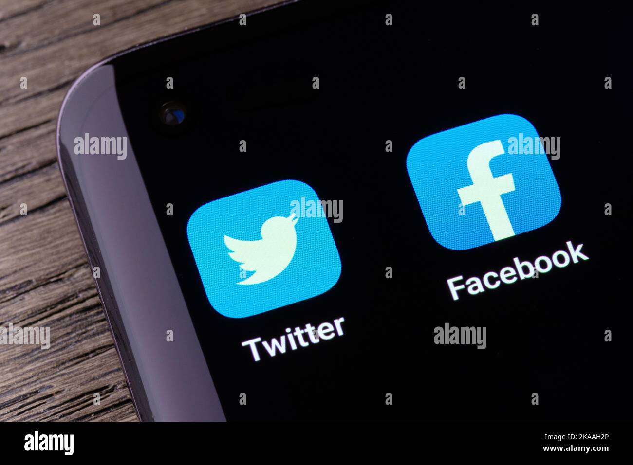 Twitter and Facebook social media apps seen on the screen of smartphone. Concept for competition. Stafford, United Kingdom, October 30, 2022 Stock Photo