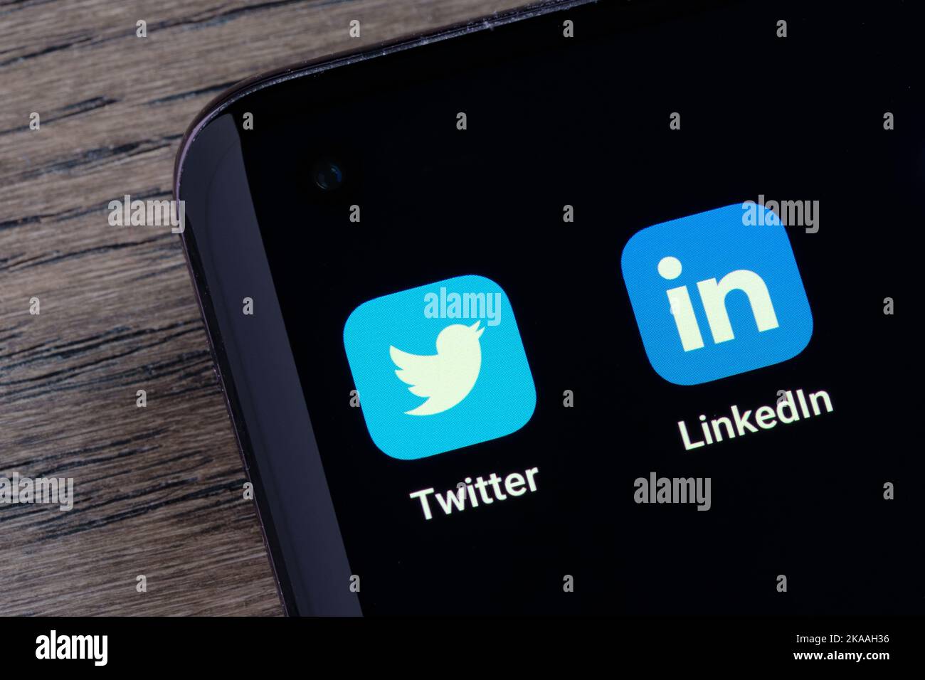 Twitter and LinkedIn apps seen on the screen of smartphone. Concept for competition. Stafford, United Kingdom, October 30, 2022 Stock Photo