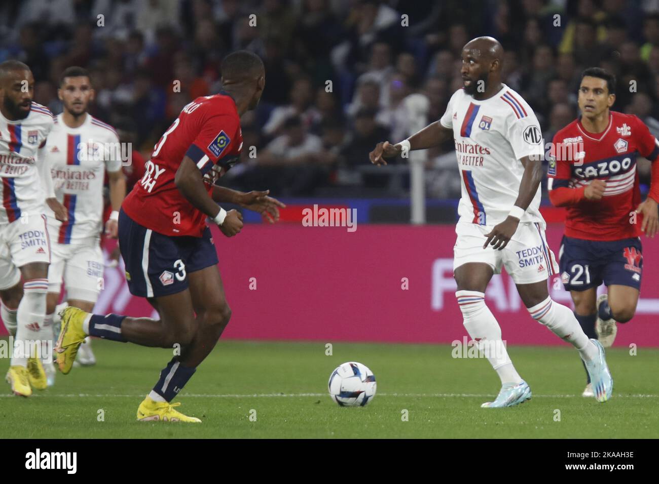 Moussa DEMBELE of Lyon and Tiago EMBALO DJALO of Lille during the French championship Ligue 1 football match between Olympique Lyonnais (Lyon) and LOSC Lille on October 30, 2022 at Groupama stadium in Decines-Charpieu near Lyon, France - Photo: Romain Biard/DPPI/LiveMedia Stock Photo