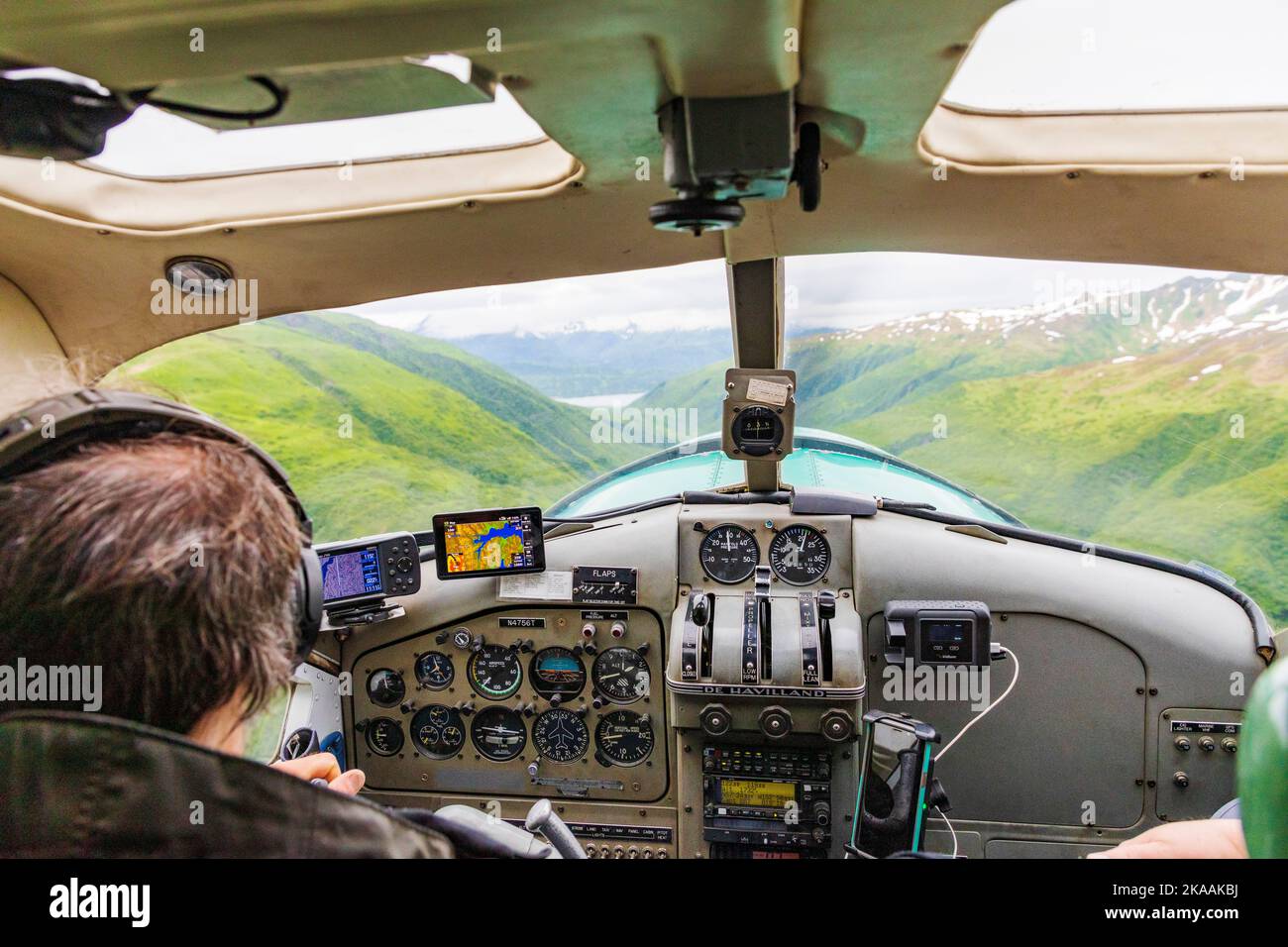 Bush pilot & guide Rolan Ruoss; Sea Hawk Air; piloting his de Havilland