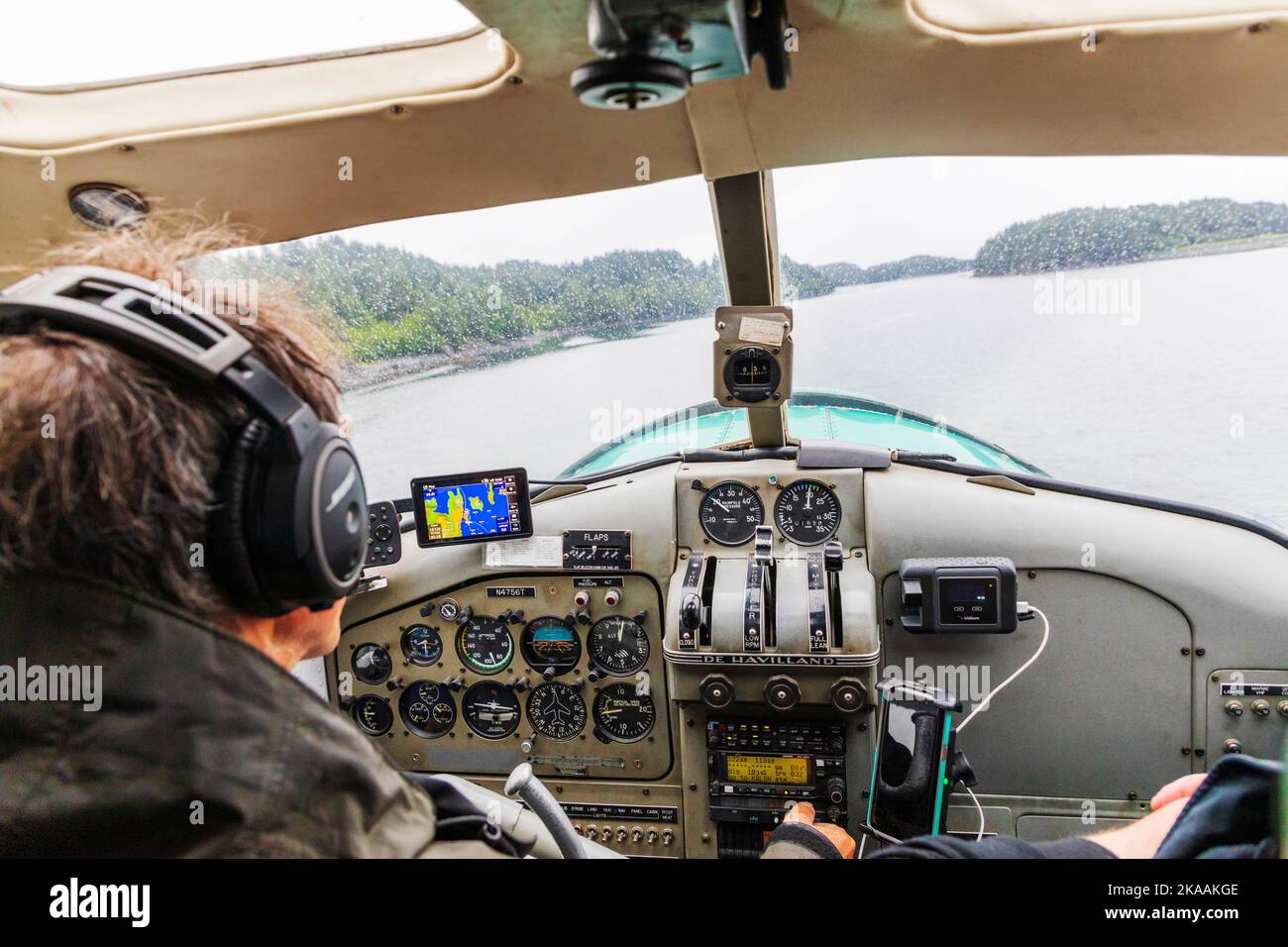 Bush pilot & guide Rolan Ruoss; Sea Hawk Air; piloting his de Havilland; Beaver; float plane; Kodiak Island; Alaska; USA Stock Photo