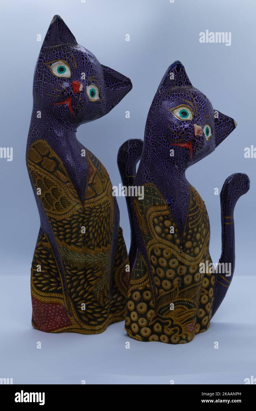 Decorative handmade wooden cats With white background Stock Photo - Alamy