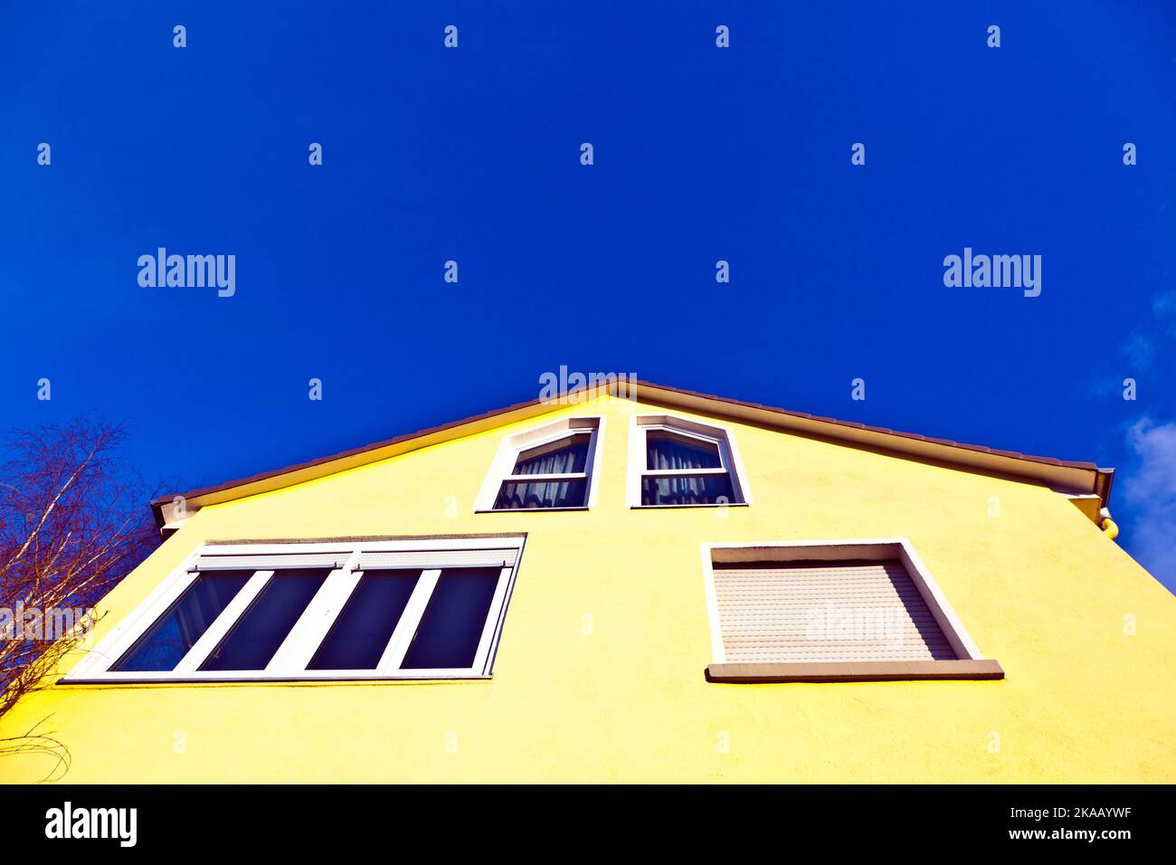 facade of house with blue sky Stock Photo - Alamy