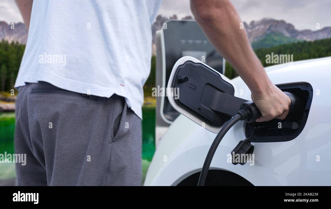 installing-electric-vehicle-charger-hi-res-stock-photography-and-images