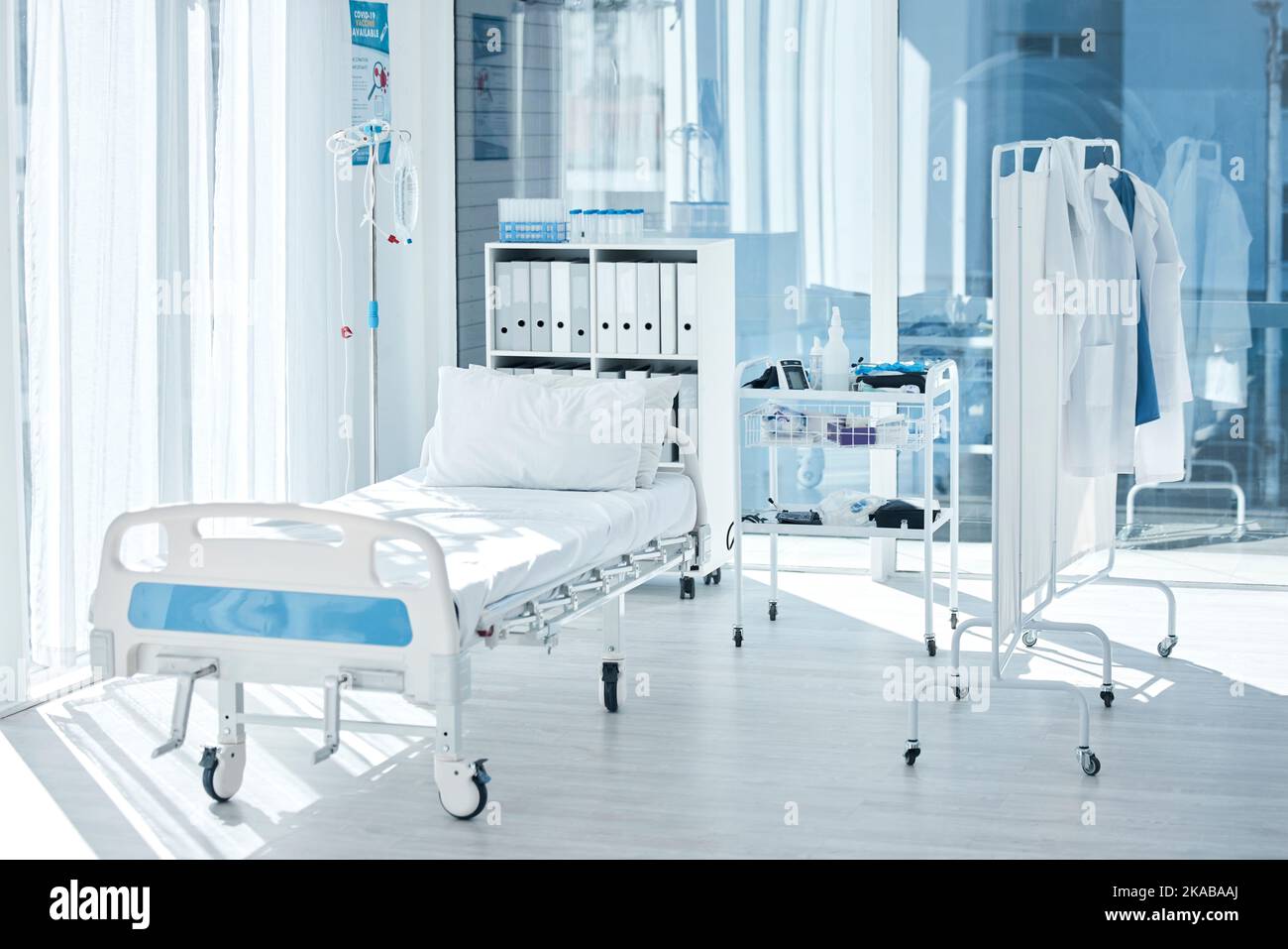 Backgrounds of empty patient room, bed and private healthcare facility, hospital and medical center of consulting, healing and rehabilitation Stock Photo