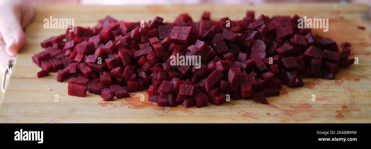 Fresh homemade sliced beets on cutting board Stock Photo