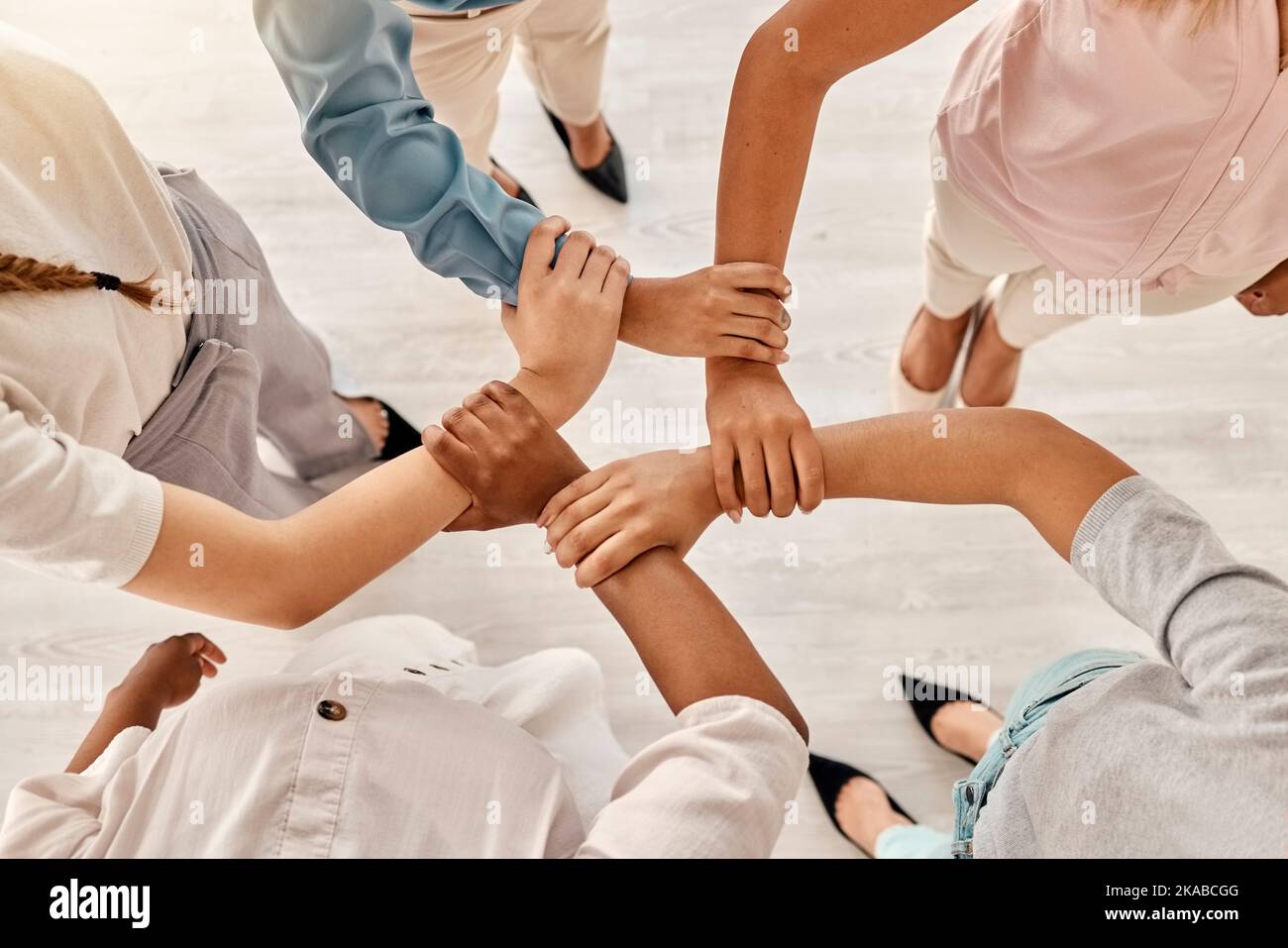 Office, employee diversity and hands together of business workers