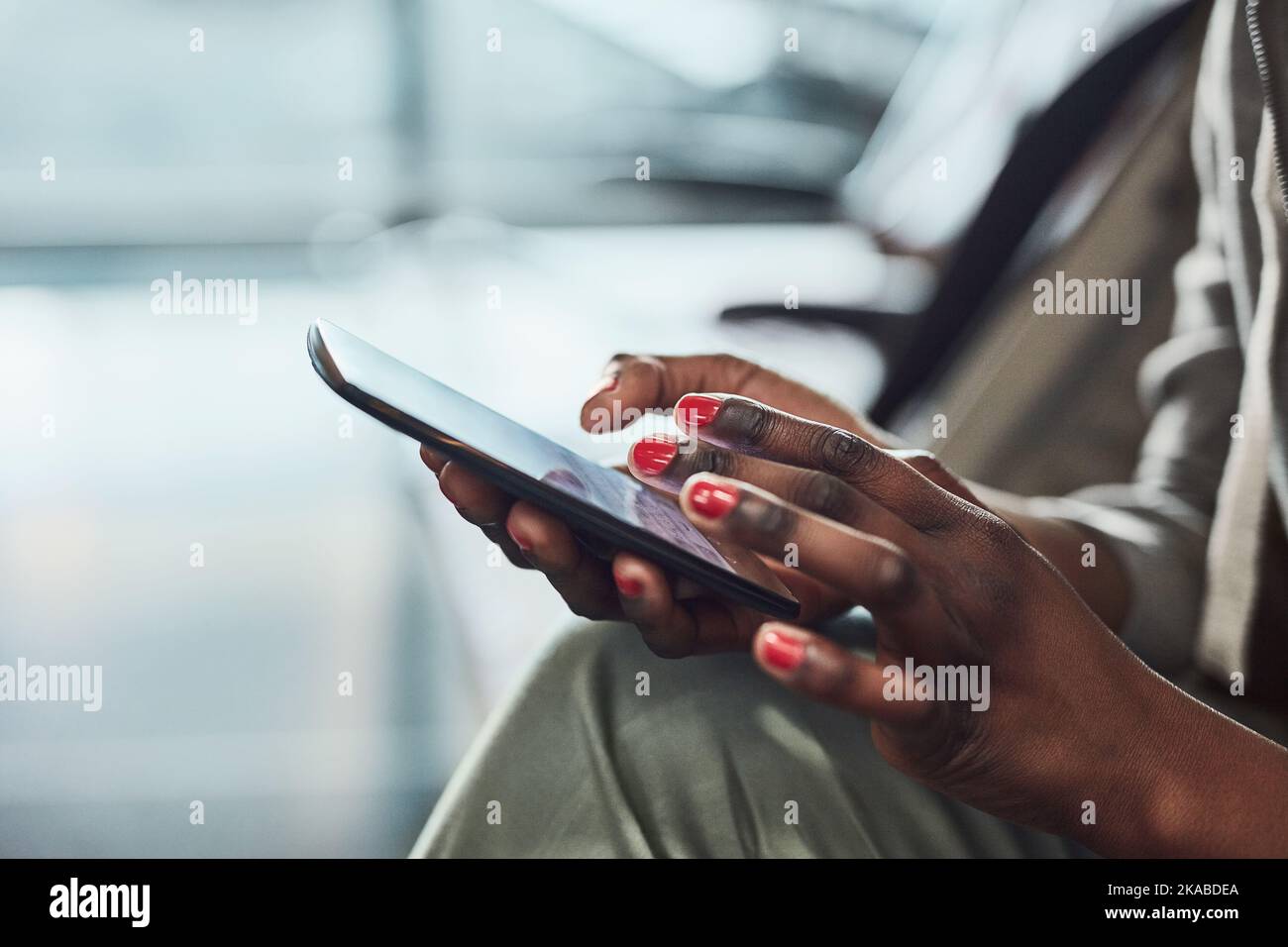 Checking for updates. an unrecognizable woman using her digital tablet. Stock Photo