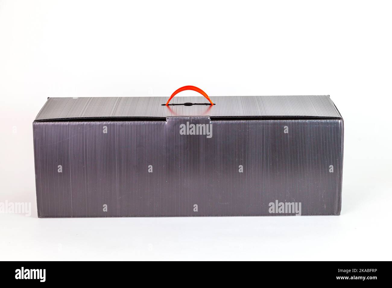 empty grey box with orange handle Stock Photo
