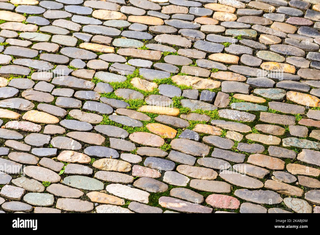 Abstract background of cobblestone pavement Stock Photo - Alamy