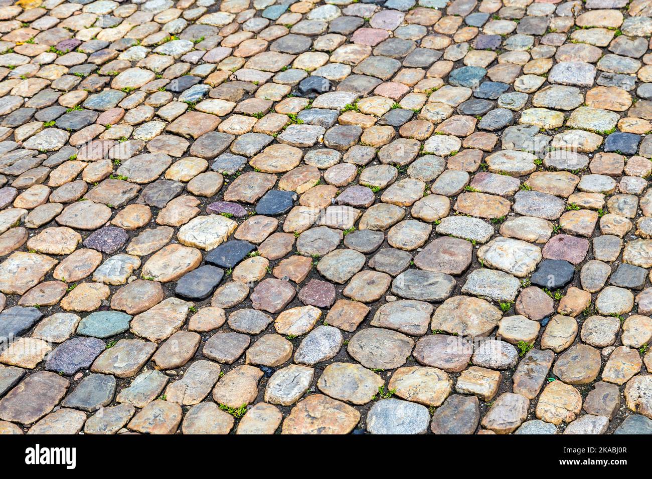 Abstract background of cobblestone pavement Stock Photo - Alamy