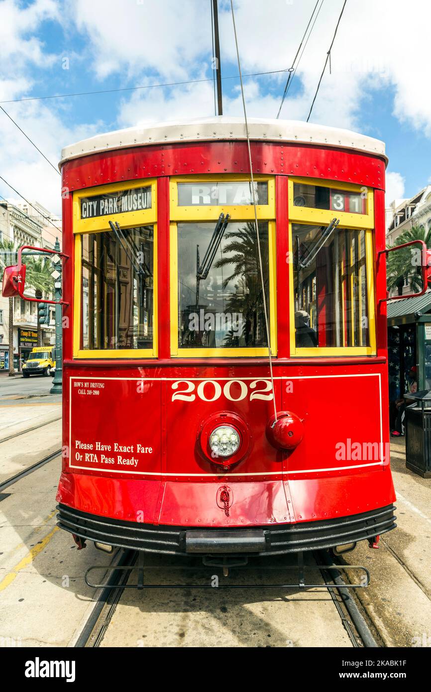 red trolley streetcar on rail in New Orleans French Quarter Stock Photo