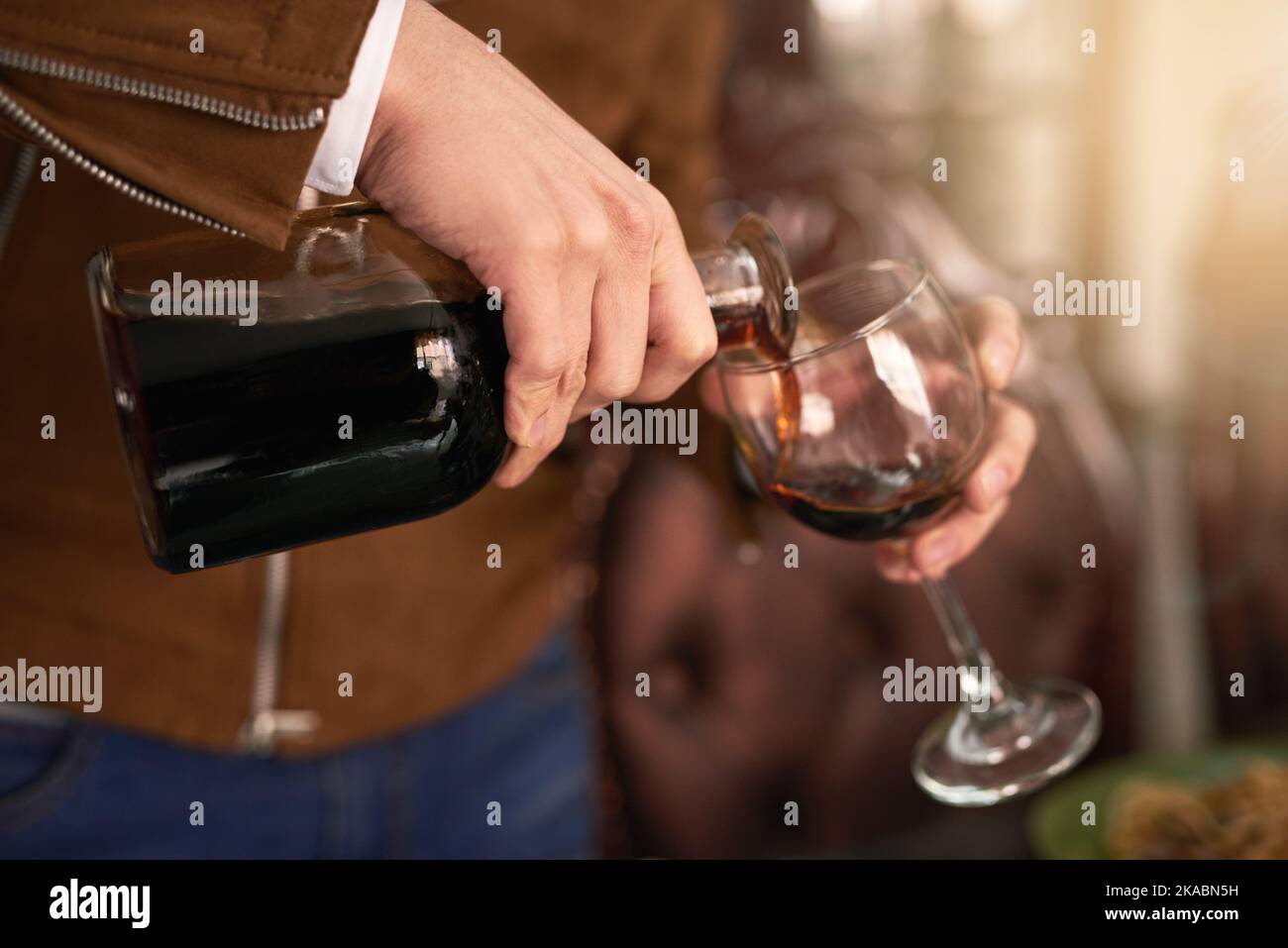 You cant have a real dinner party without wine. an unrecognizable man