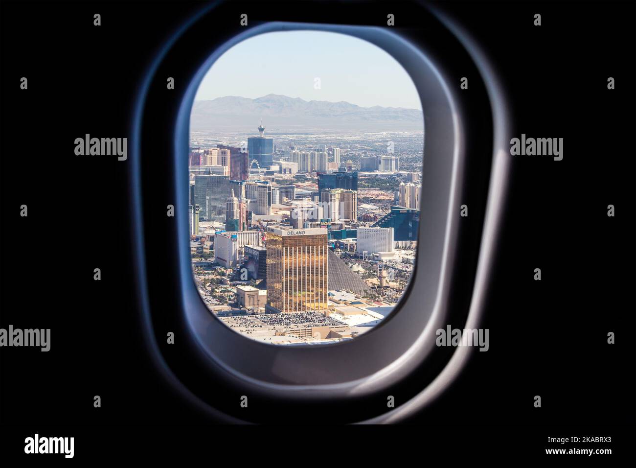 Las Vegas view through a jet plane window high on the blue sky Stock ...