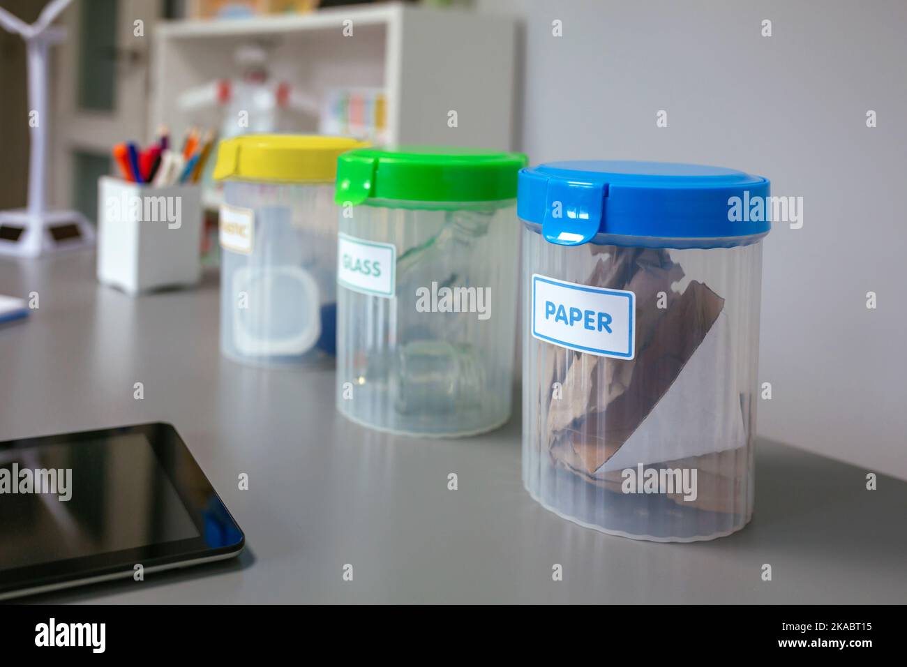 Selective trash bins and over desk in environmental classroom Stock