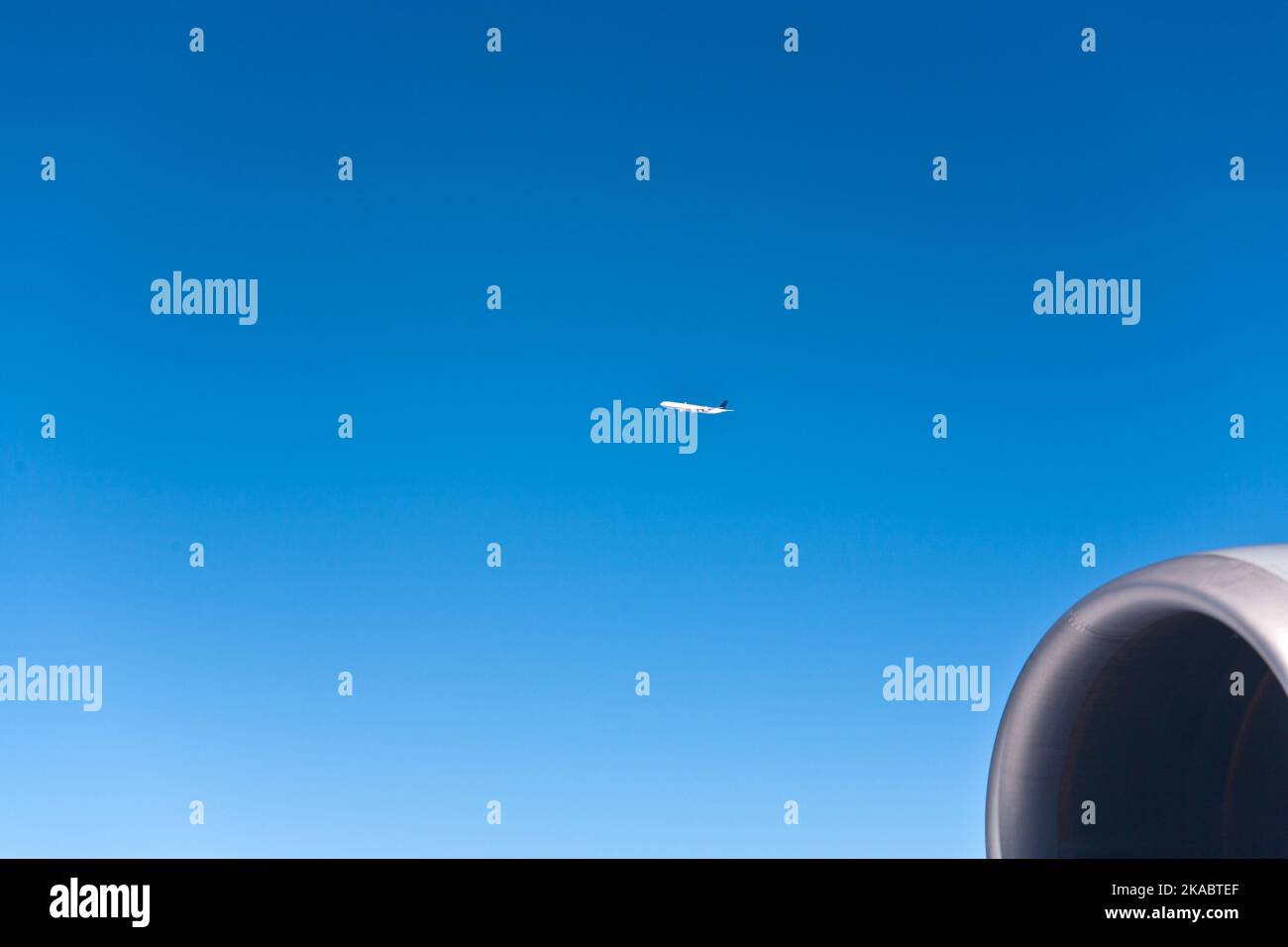 aircraft flying over the clouds Stock Photo - Alamy