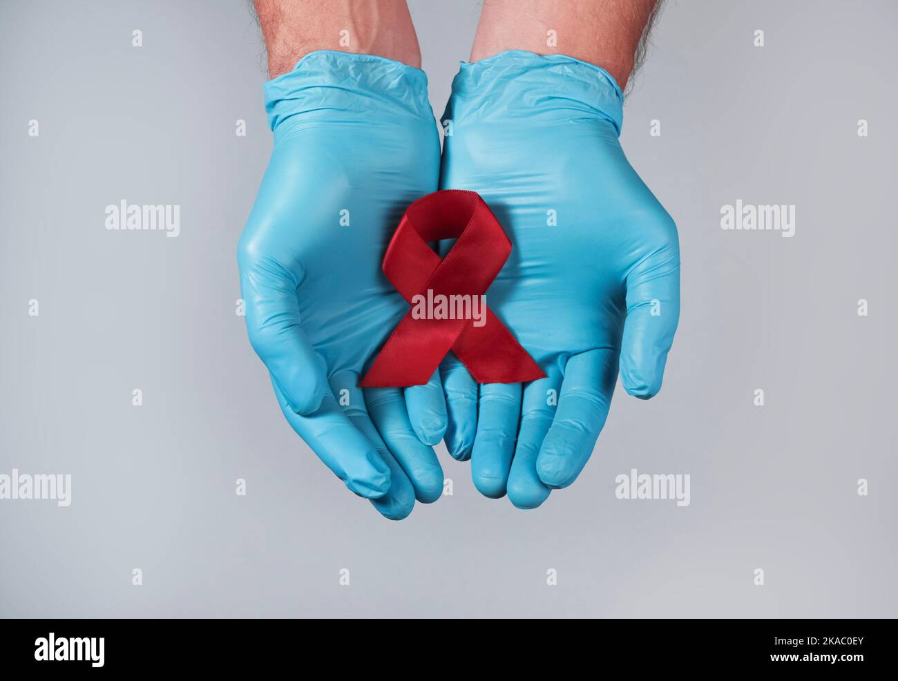 Hiv ribbon nurse hi-res stock photography and images - Alamy
