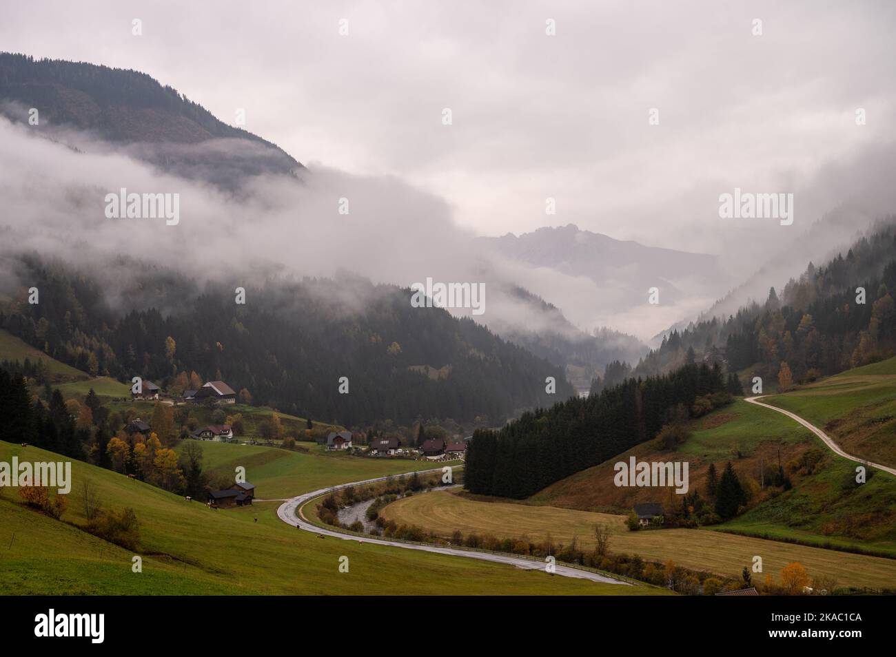 Nebel in den Alpen Stock Photo