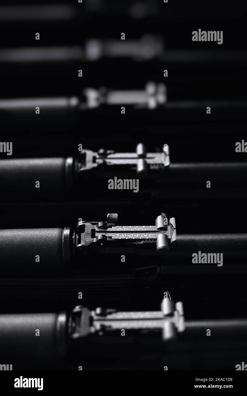 Stocks of weapons. New automatic rifles in a box. The sighting bar of