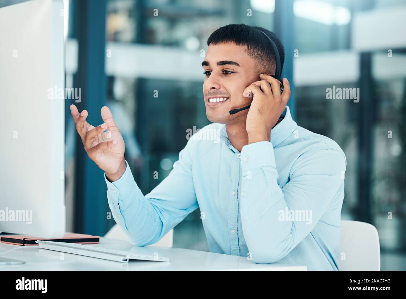 Computer, communication and telemarketing consultant working on