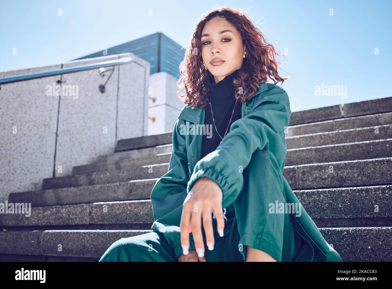 Fashion, travel and woman student on building steps in a city, with vision for mission, goal and mindset. Portrait, girl and exchange student on a Stock Photo