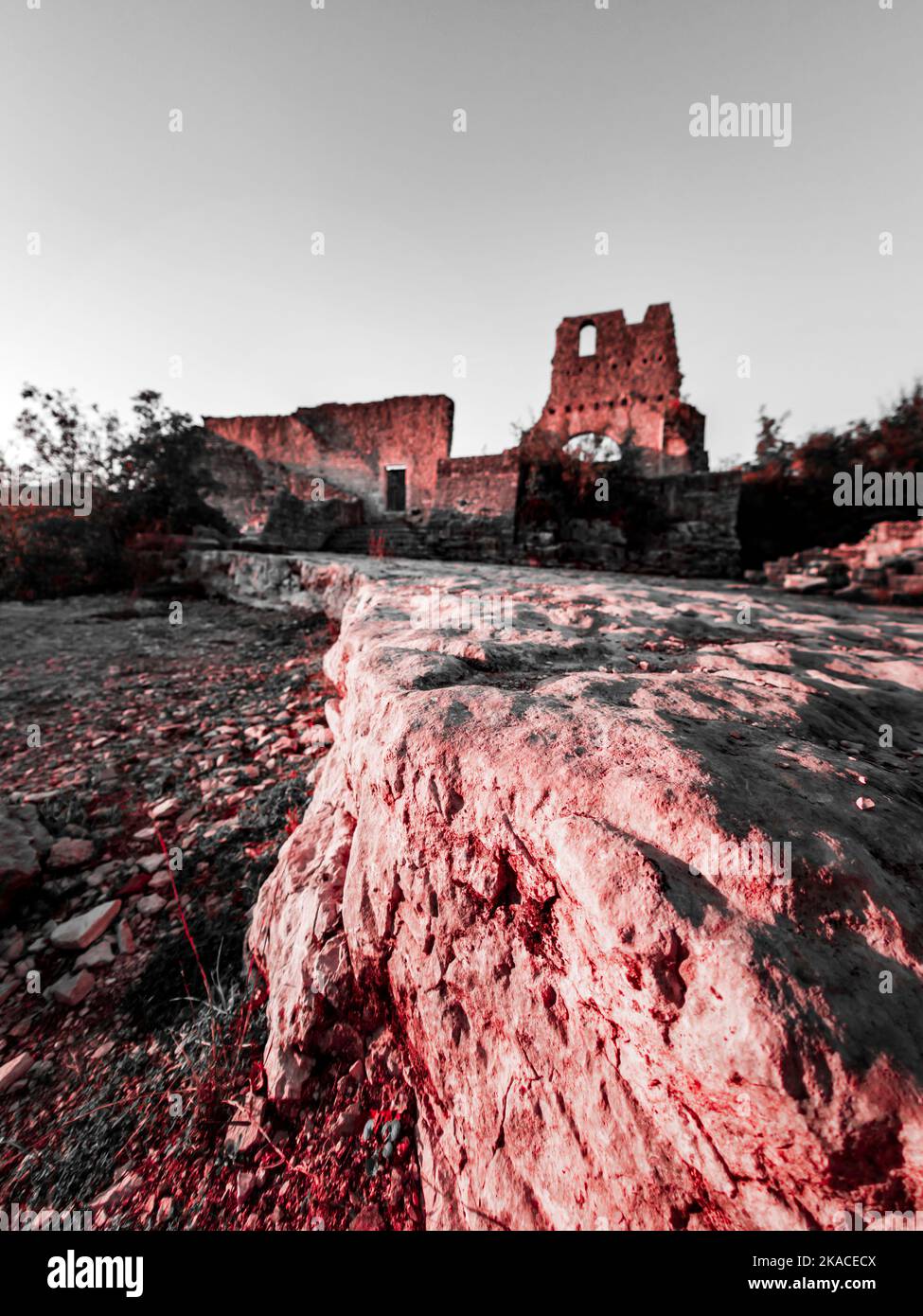 Remains of abandoned derelict old town Dvigrad in Istria Croatia Europe, creative artistic altered color, close up detail closeup blurry background Stock Photo
