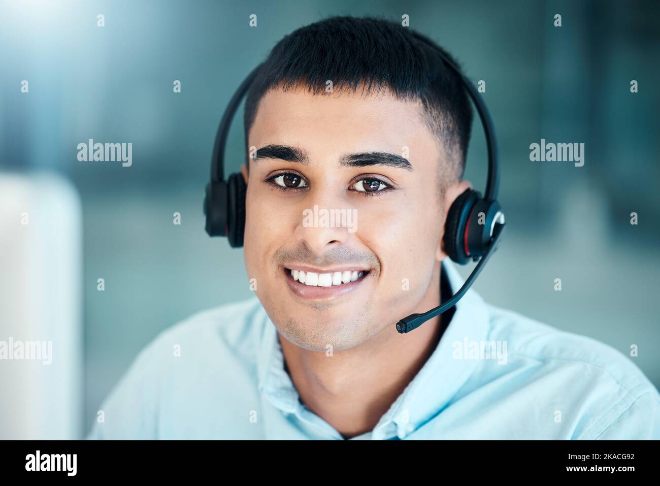 Happy call center man, CRM or customer support employee for