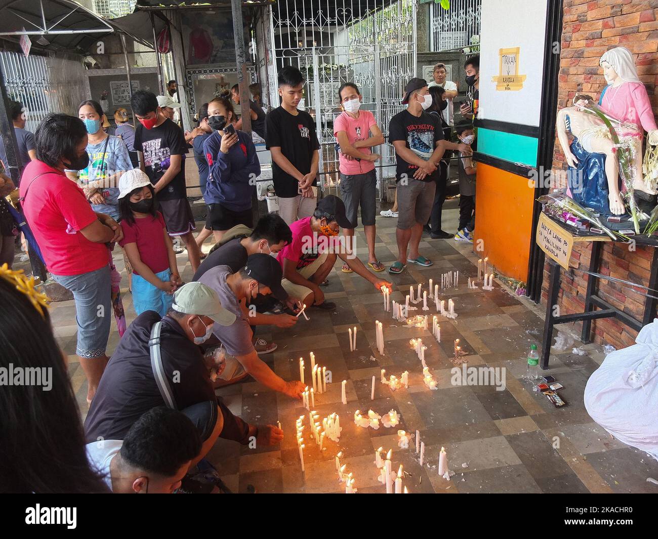 Caloocan, Philippines 1 Nov 2022, Cemetery visitors who's deceased relatives tomb is in