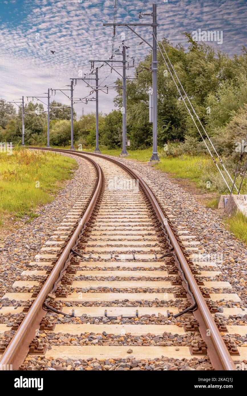 Electric Railroad in Industrial area. Supply Chain metaphore for Distribution, Freight, Cargo