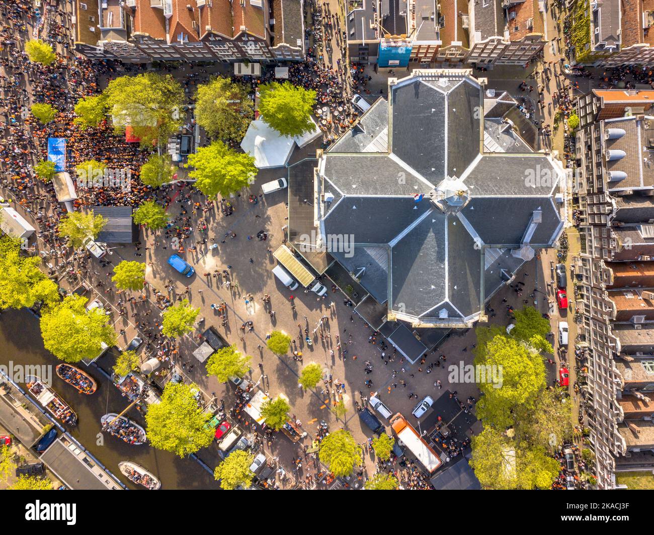 Amsterdam aerial view Market square Noordermarkt on Koningsdag Kings day festivities. Birthday of the king. Seen from helicopter. Stock Photo