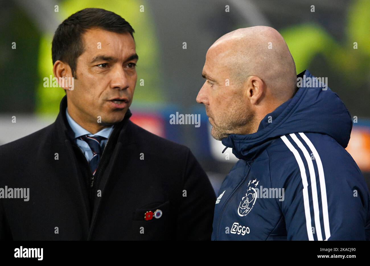 Glasgow, Scotland, 1st November 2022.   Rangers Manager Giovanni van Bronckhorst and Ajax manager Alfred Schreuder during the UEFA Champions League match at Ibrox Stadium, Glasgow. Picture credit should read: Neil Hanna / Sportimage Stock Photo