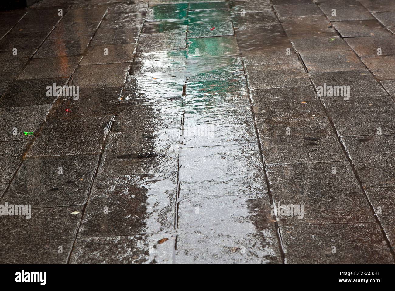 pattern of paveway in rain Stock Photo - Alamy