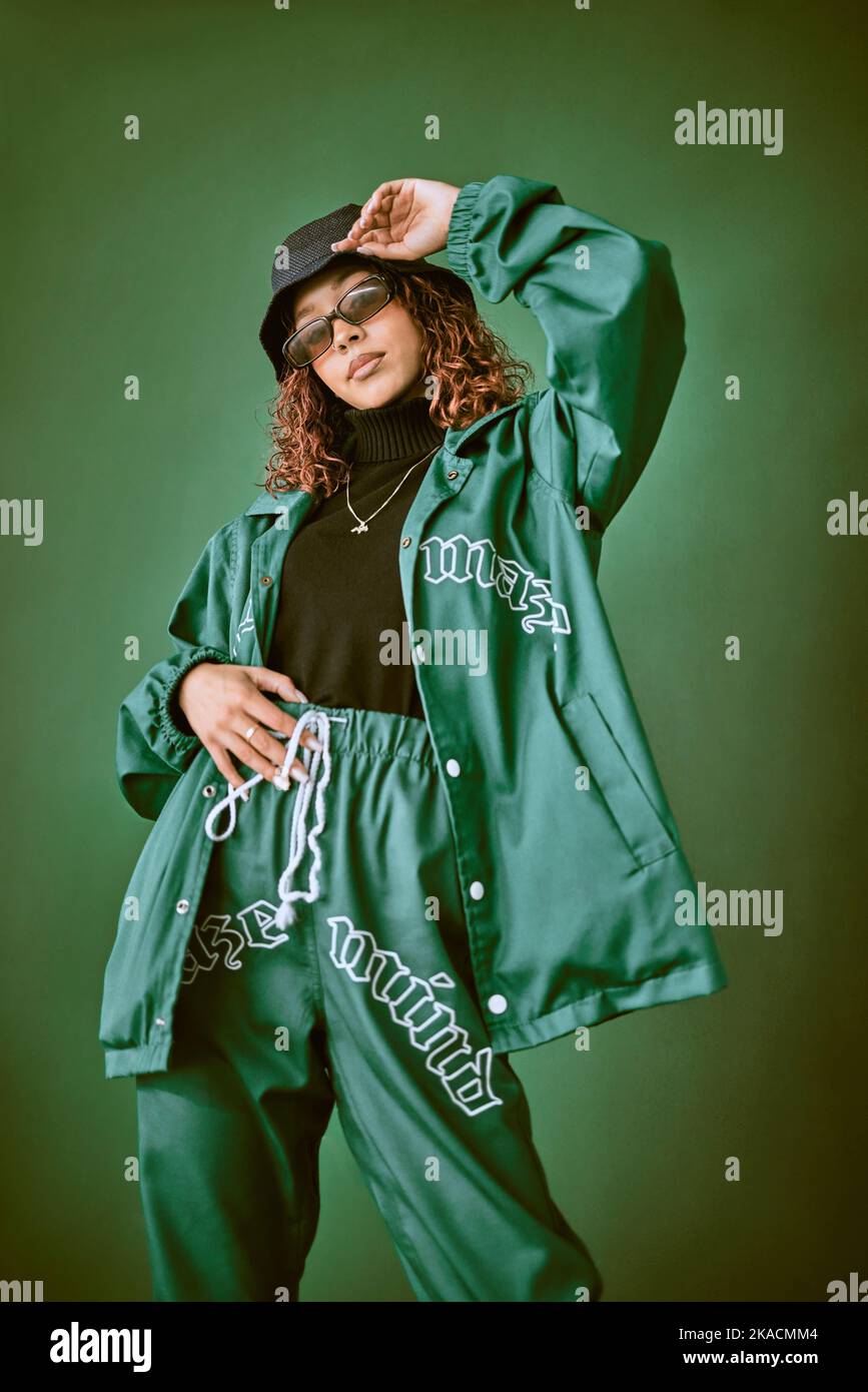 https://c8.alamy.com/comp/2KACMM4/fashion-clothes-style-and-black-woman-with-green-rap-gen-z-or-hip-hop-aesthetic-outfit-for-cool-edgy-or-fashionable-look-designer-brand-apparel-2KACMM4.jpg