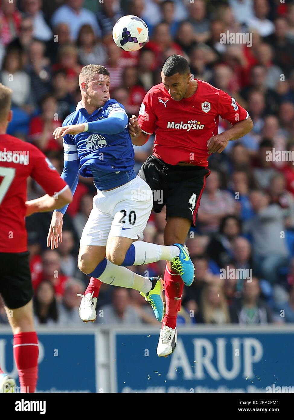 31st August 2013- Barclays Premiership - Cardiff City Vs Everton - Ross Barkley of Everton and Steven Caulker of Cardiff City challenge for a header - Photo: Paul Roberts/Pathos. Stock Photo