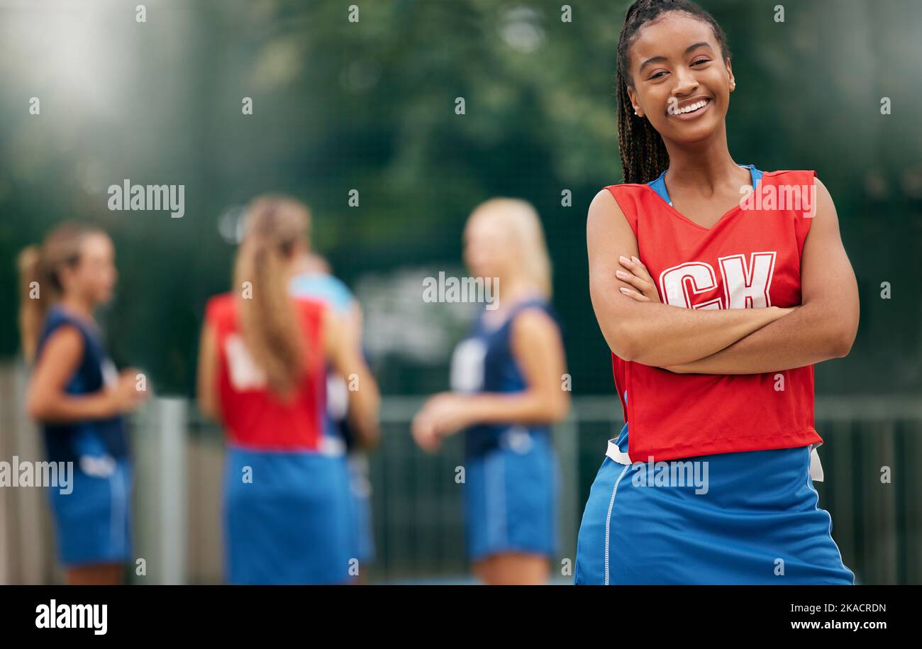 Portrait, netball and black woman on sports court ready for game, competition or match. Health, fitness and happy players outdoors preparing for Stock Photo