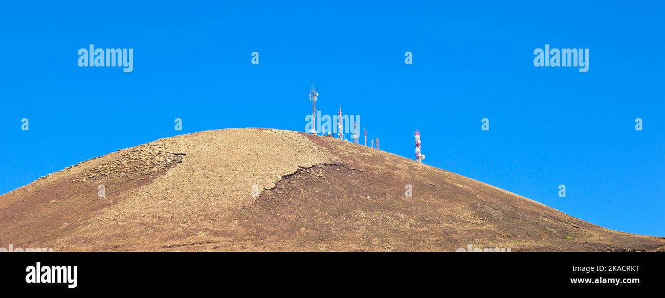 Radio telecommunications tower on top of an old volcano in Lanzarote, Spain  Stock Photo - Alamy