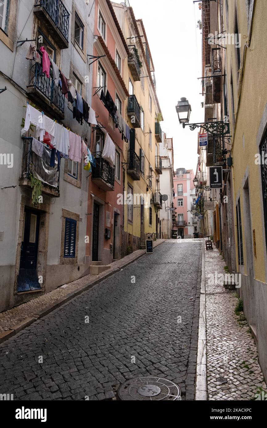LISBON, OLD TOWN: A street scene from the hilly narrow streets of ...