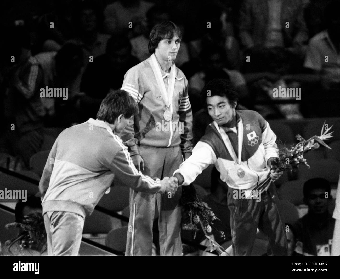 OLYMPIC SUMMERGAMES IN LOS ANGELES USA 1984 Vincent Maenza Italy win light flyweight on podium with Markus Scherer Germany and Ikuzo Saito Japan Stock Photo