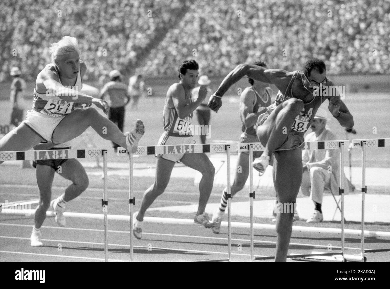 OLYMPIC SUMMER GAMES IN LOS ANGELES USA 1984 ARTO BRYGGARE Finland and Greg Foster USA fighting for the medals in 110 m hurdle Stock Photo