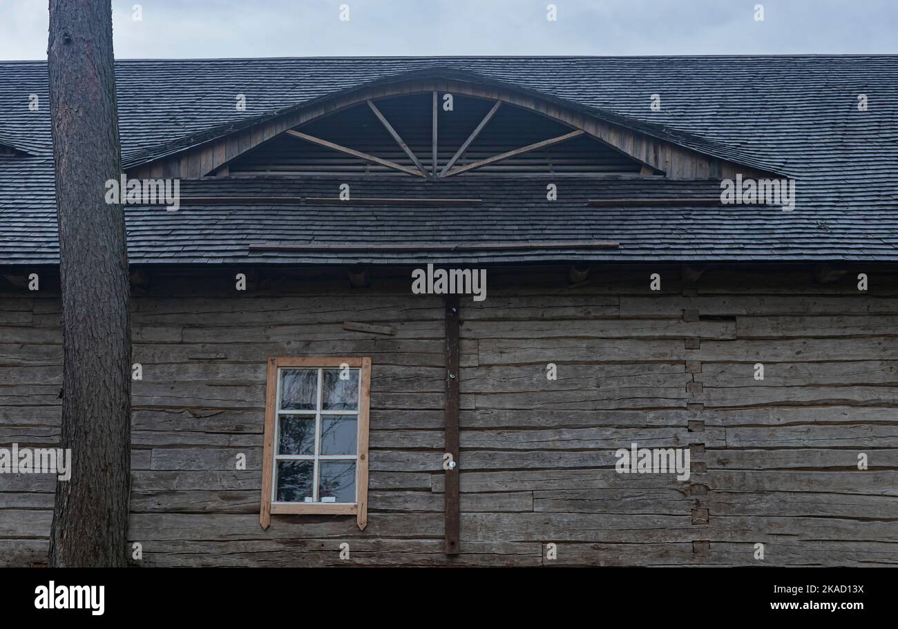 Window on old ancient wood house wall Stock Photo - Alamy