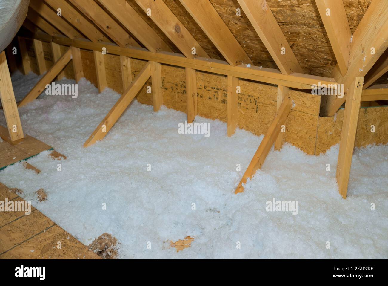 New homes attic insulation roof is being poured with eco wool