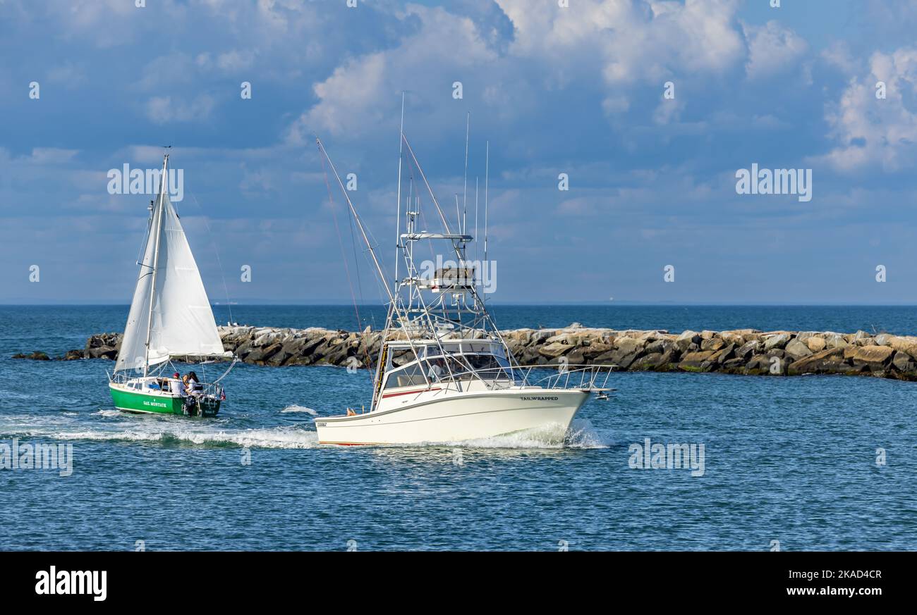 Fishing boat, Tail Wrapped coming into Montauk Harbor Stock Photo