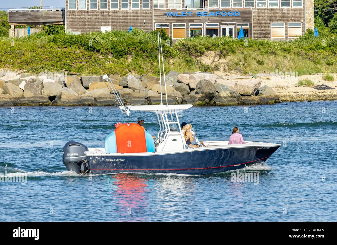 Blue regulator motor boat coming into montauk Stock Photo Alamy